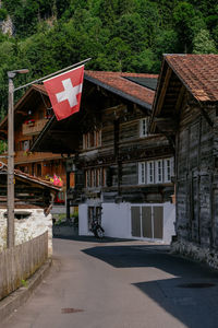 Street amidst houses and buildings in city