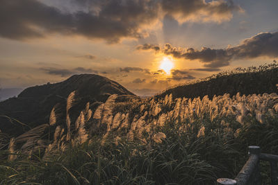 Scenic view of mountains against sky during sunset