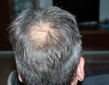 Rear view of mature man with gray hair