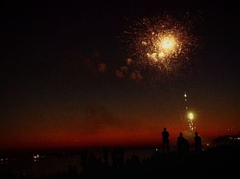 Firework display at night