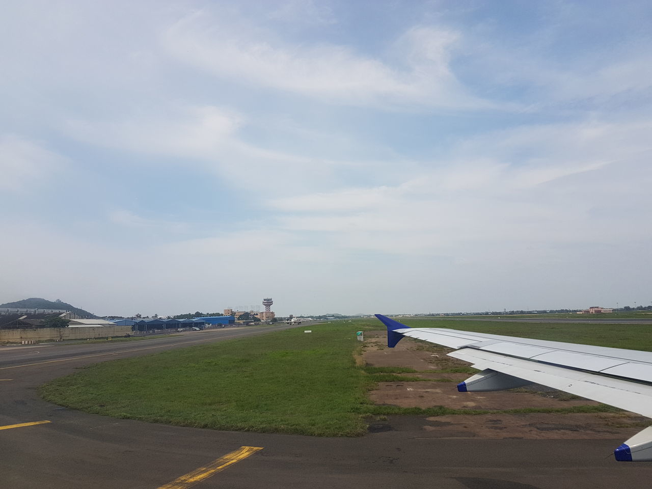 AIRPLANE ON CLOUDY SKY