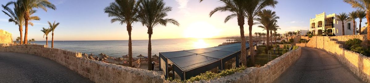 Panoramic view of beach at sunset