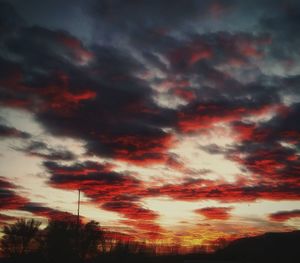 Low angle view of dramatic sky during sunset