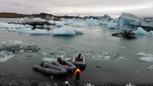 Scenic view of frozen sea against sky