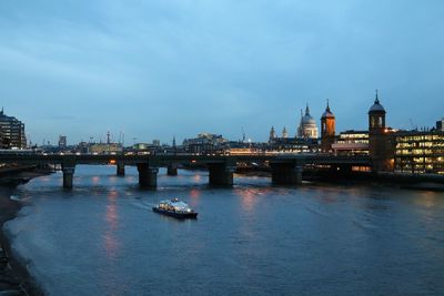 Bridge over river in city