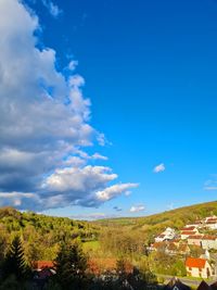 Scenic view of townscape against sky