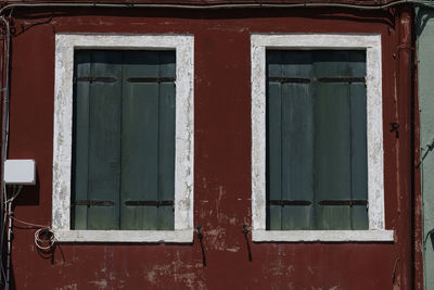 Closed window of old building