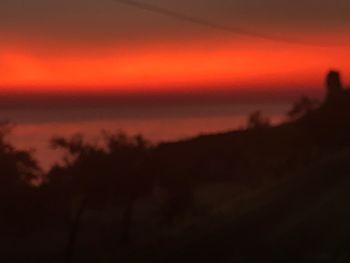 Scenic view of dramatic sky during sunset