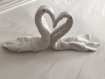 High angle view of heart shape on bed