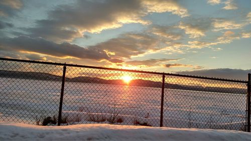 Snow covered landscape at dusk