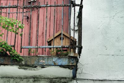 Abandoned building against wall