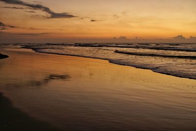 Scenic view of sea at sunset