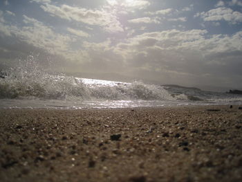 Scenic view of beach against sky