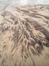 High angle view of sand on beach