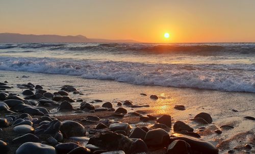 Scenic view of sea during sunset