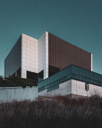 Low angle view of modern building against clear sky