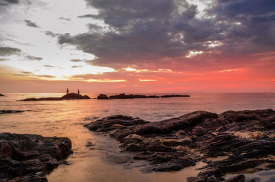 Scenic view of sea against sky during sunset