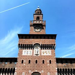 Low angle view of building against blue sky