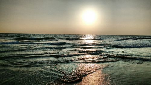 Scenic view of sea at sunset