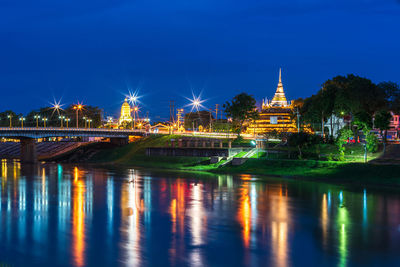 Illuminated buildings in water