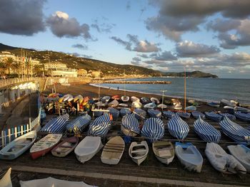 High angle view of boats moored on beach against sky