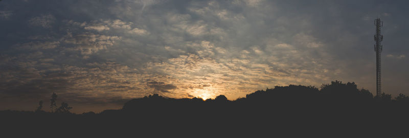 Scenic view of silhouette landscape against sky during sunset