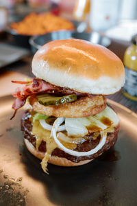 Close-up of burger in plate on table