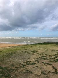 Scenic view of beach against sky