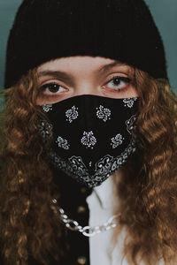 Close-up portrait of young woman in winter