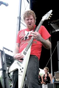 Low angle view of man playing guitar