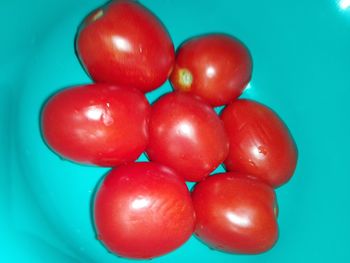 High angle view of cherry tomatoes on table