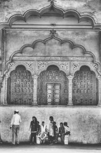 Group of people in front of building
