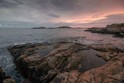 Scenic view of sea against sky during sunset