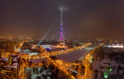 Illuminated buildings in city at night