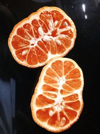 High angle view of orange slice on table