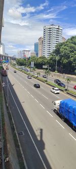 High angle view of street amidst buildings in city