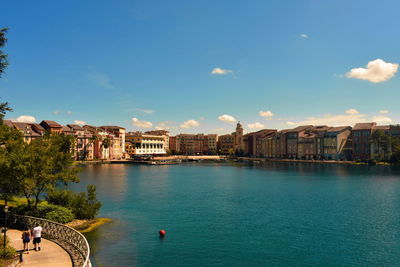 Portofino bay hotel, all the charm of italy. couple walking together, outdoor, in the forest side.