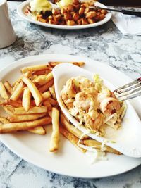 Close-up of food served in plate on table