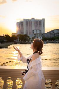 Rear view of woman looking at sea