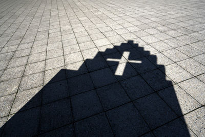 Shadow of a church on the ground