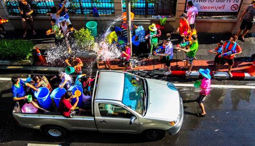 High angle view of people celebrating water festival