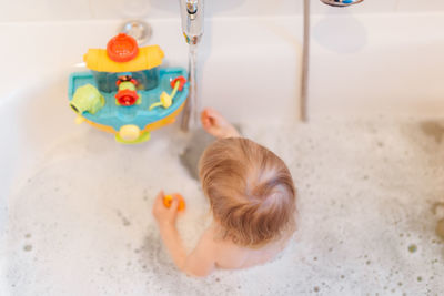 High angle view of stuffed toy in bathroom