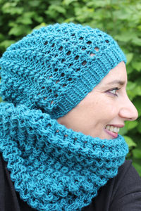 Close-up portrait of woman wearing hat