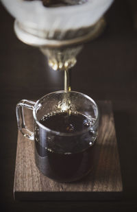 Close-up of coffee cup on table