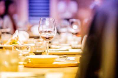 Glass of wine on table in restaurant