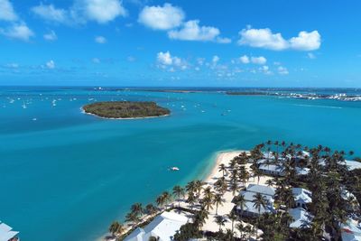 Scenic view of sea against blue sky