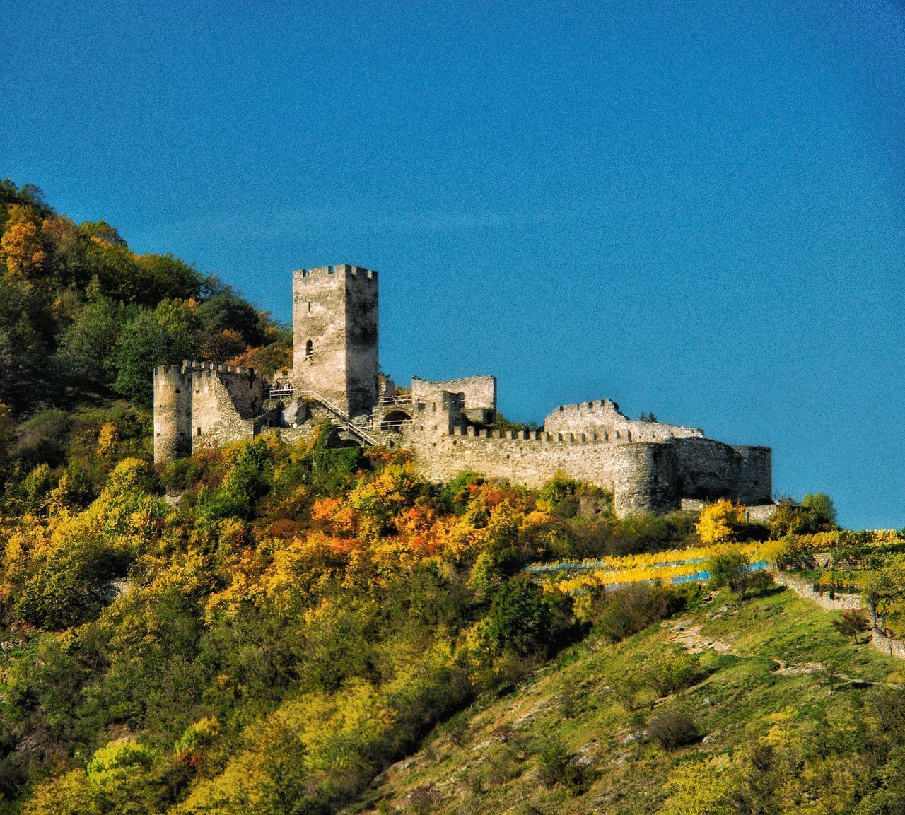 VIEW OF FORT AGAINST THE WALL OF A CASTLE