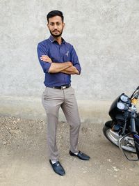 Portrait of young man standing outdoors