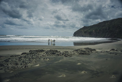 Scenic view of beach against sky