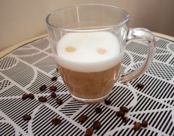 Close-up of coffee cup on table